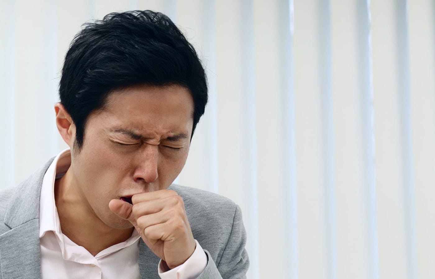 Man coughing